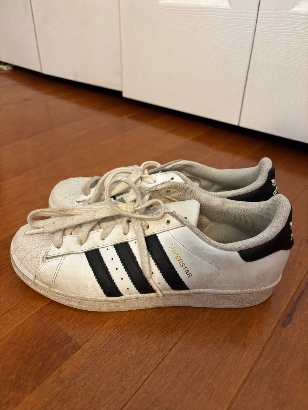 adidas White Superstar Sneakers with Black Stripes